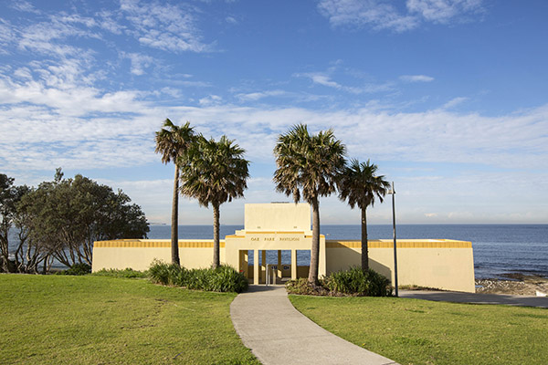 Art deco style pavilion with ocean backdrop