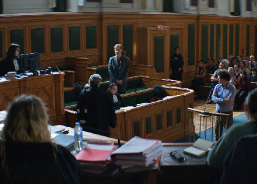 Still from film Anatomy of a Fall. A wide shot of a courtroom scene.
