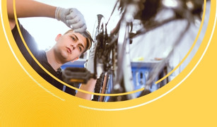 Teenager doing bike maintenance