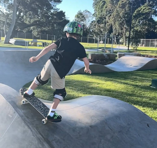 Skate boarder on Pump track