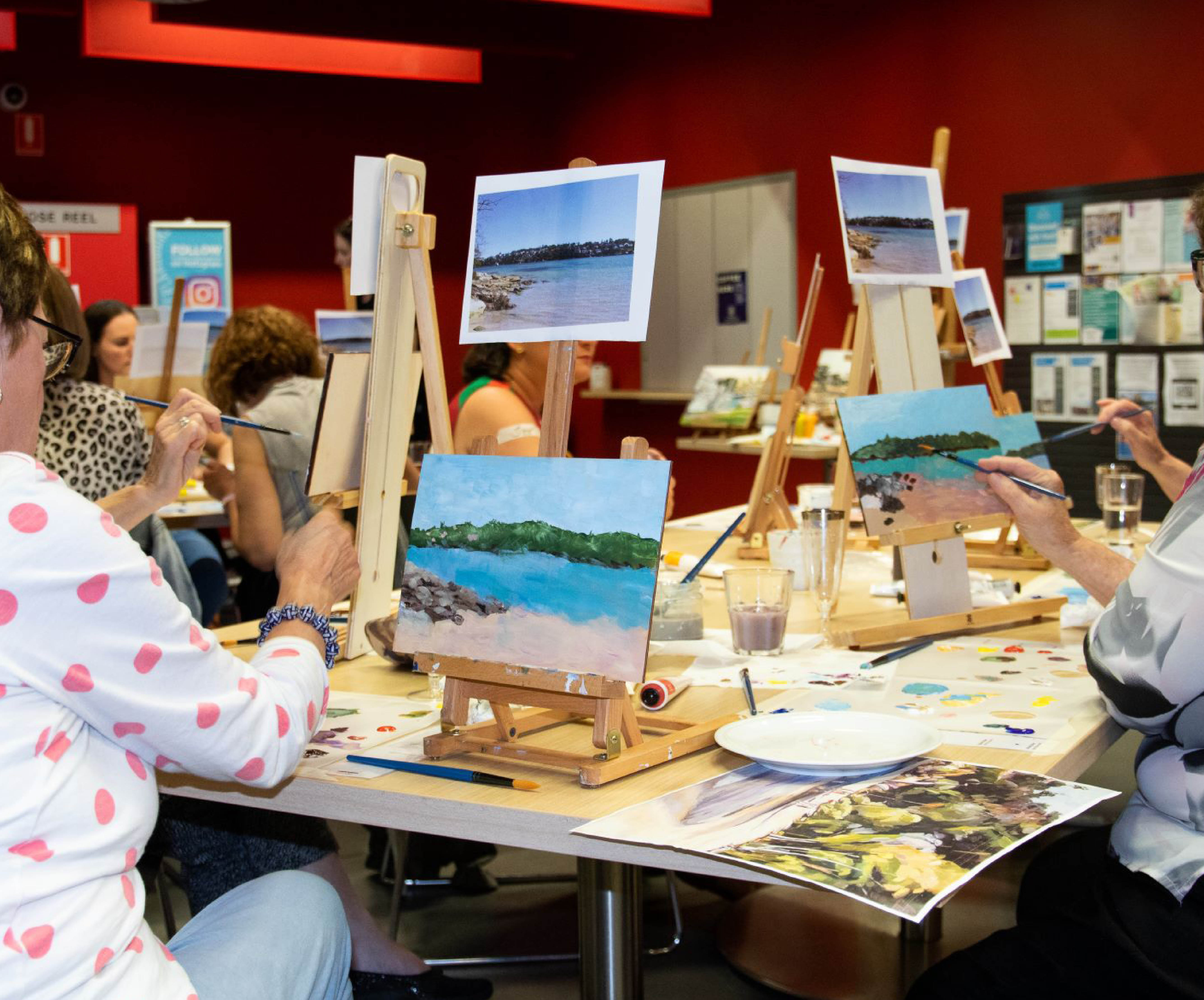 women painting landscapes in cronulla library