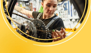 Women doing bike maintenance