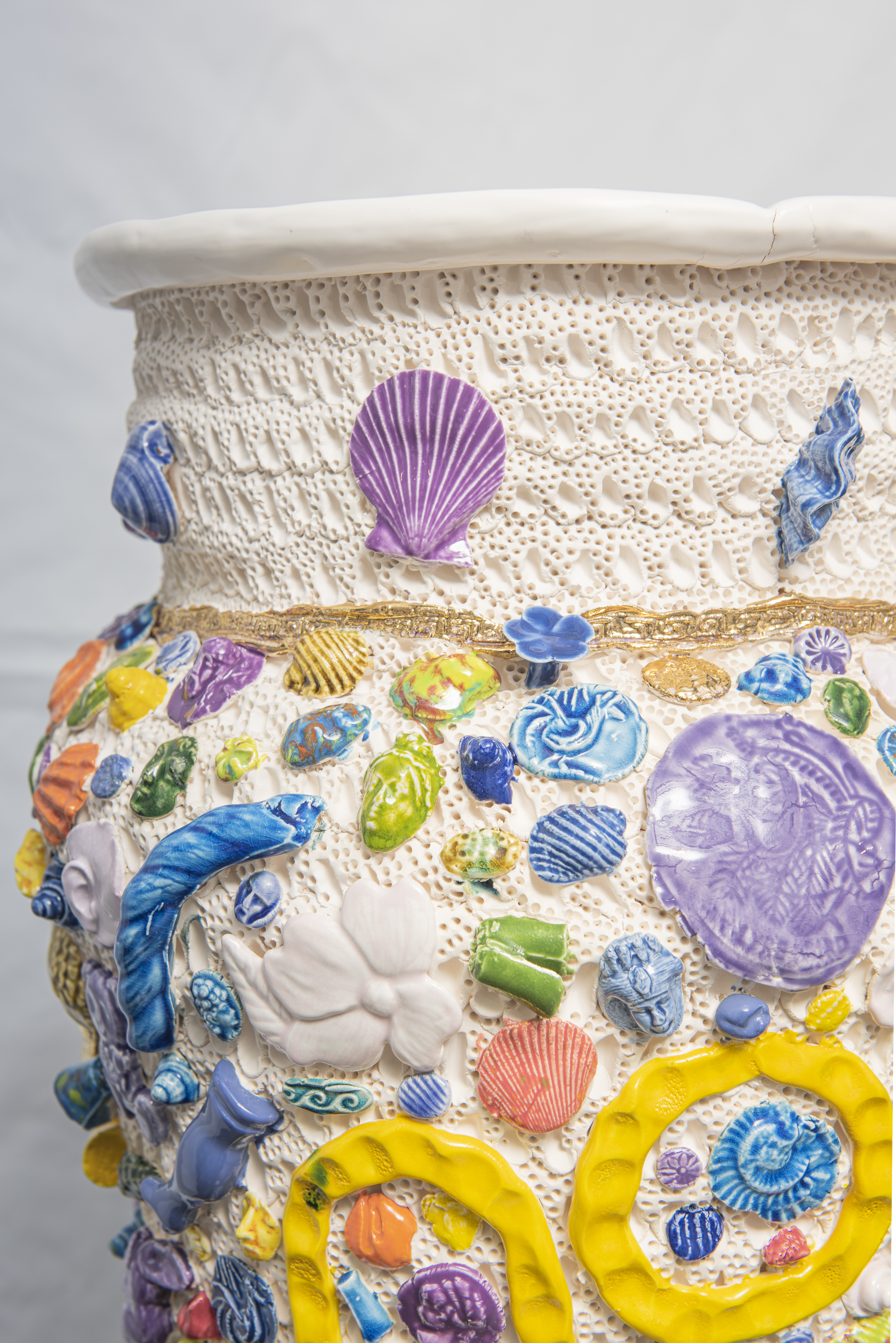 Photograph of a colourful ceramic object by artist Glenn Barkley.